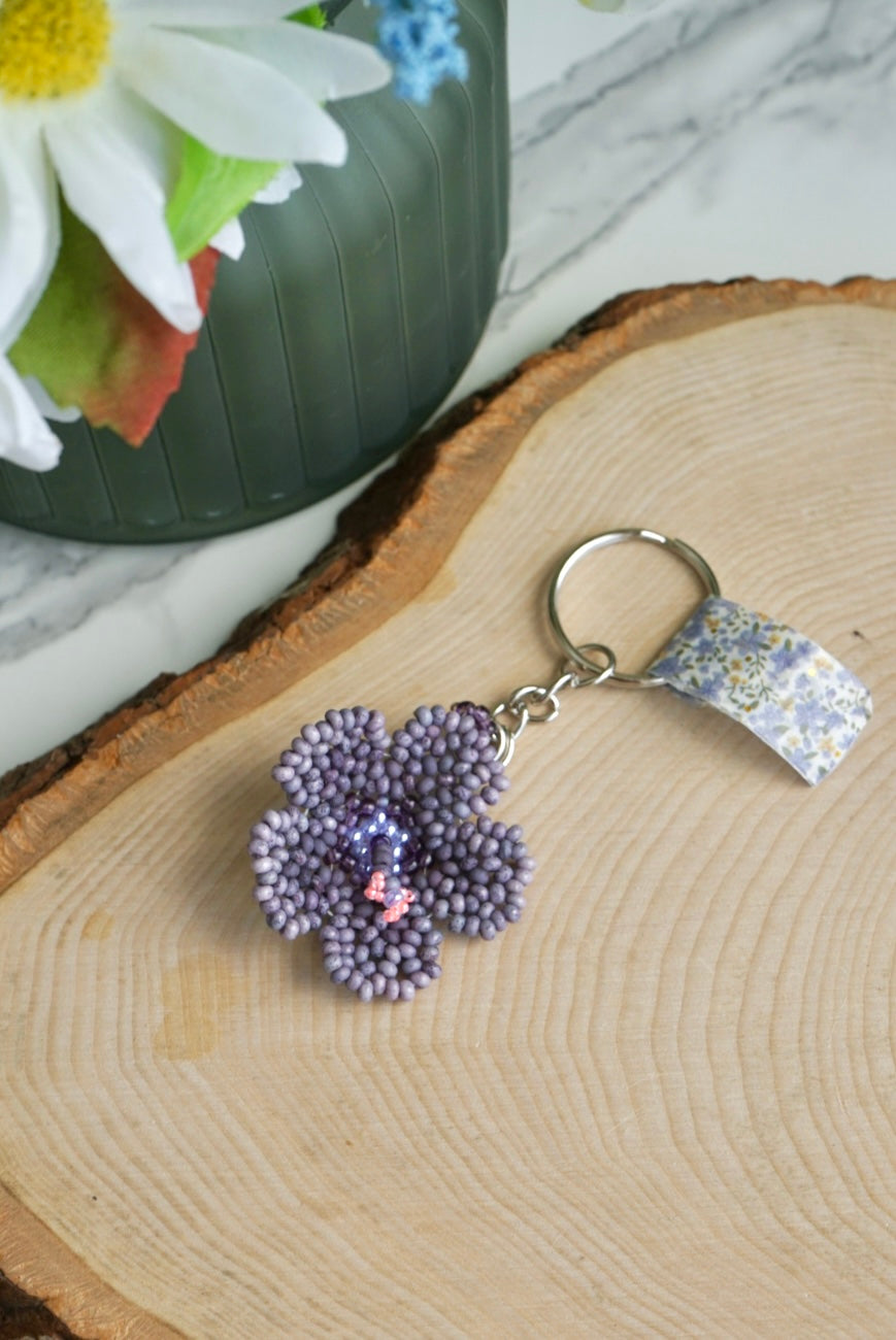 Deep purple hibiscus keychain