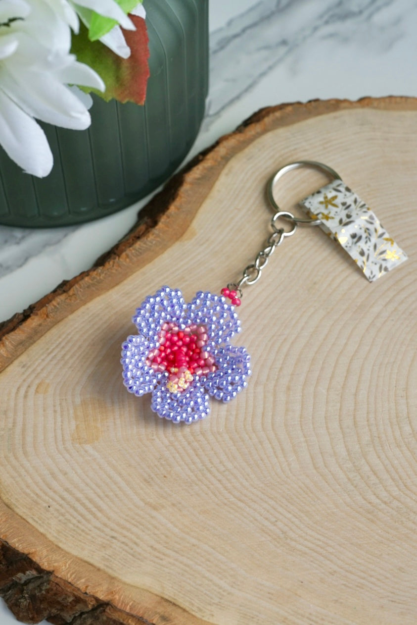 Periwinkle luster hibiscus flower keychain
