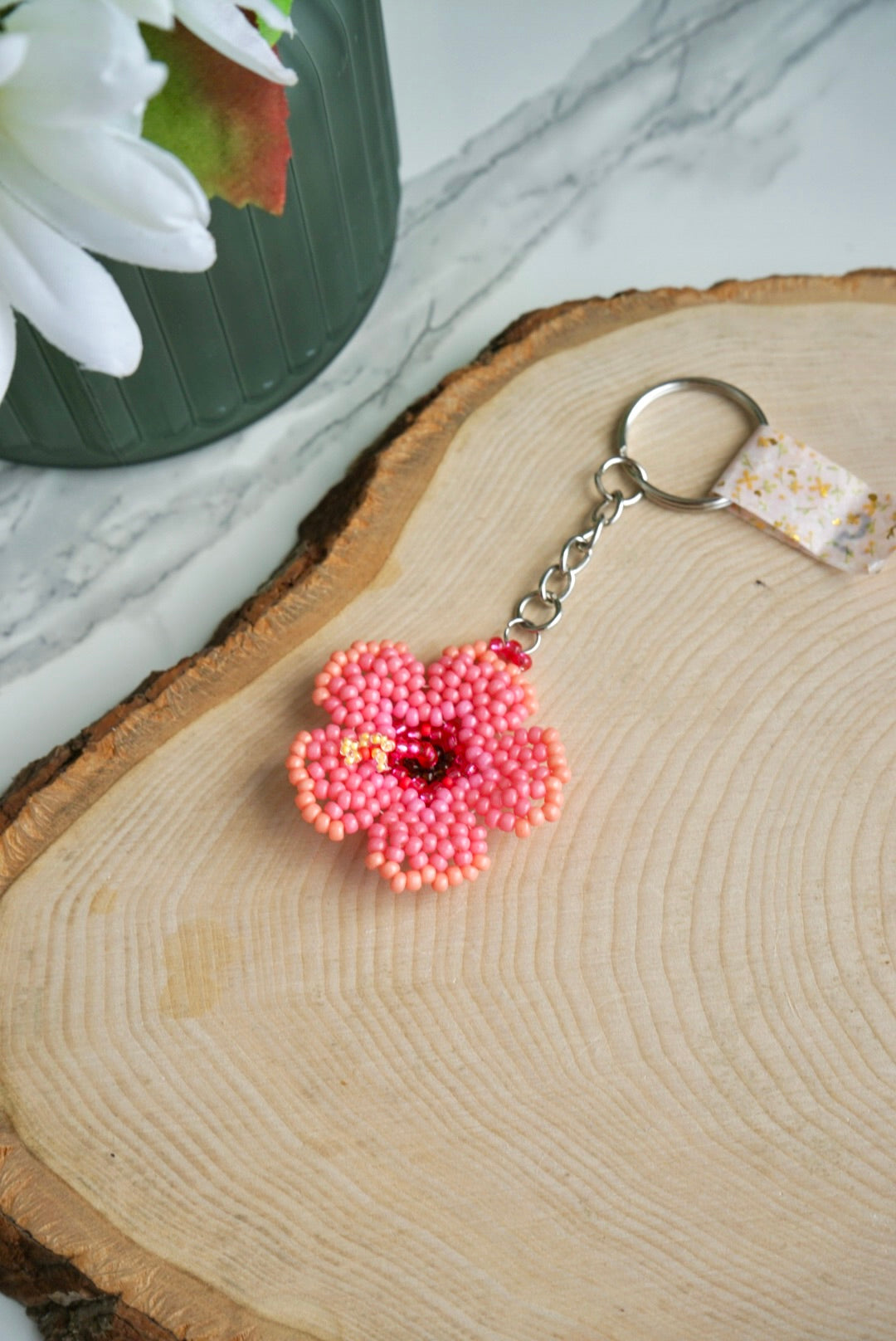 Peachy pink hibiscus keychain