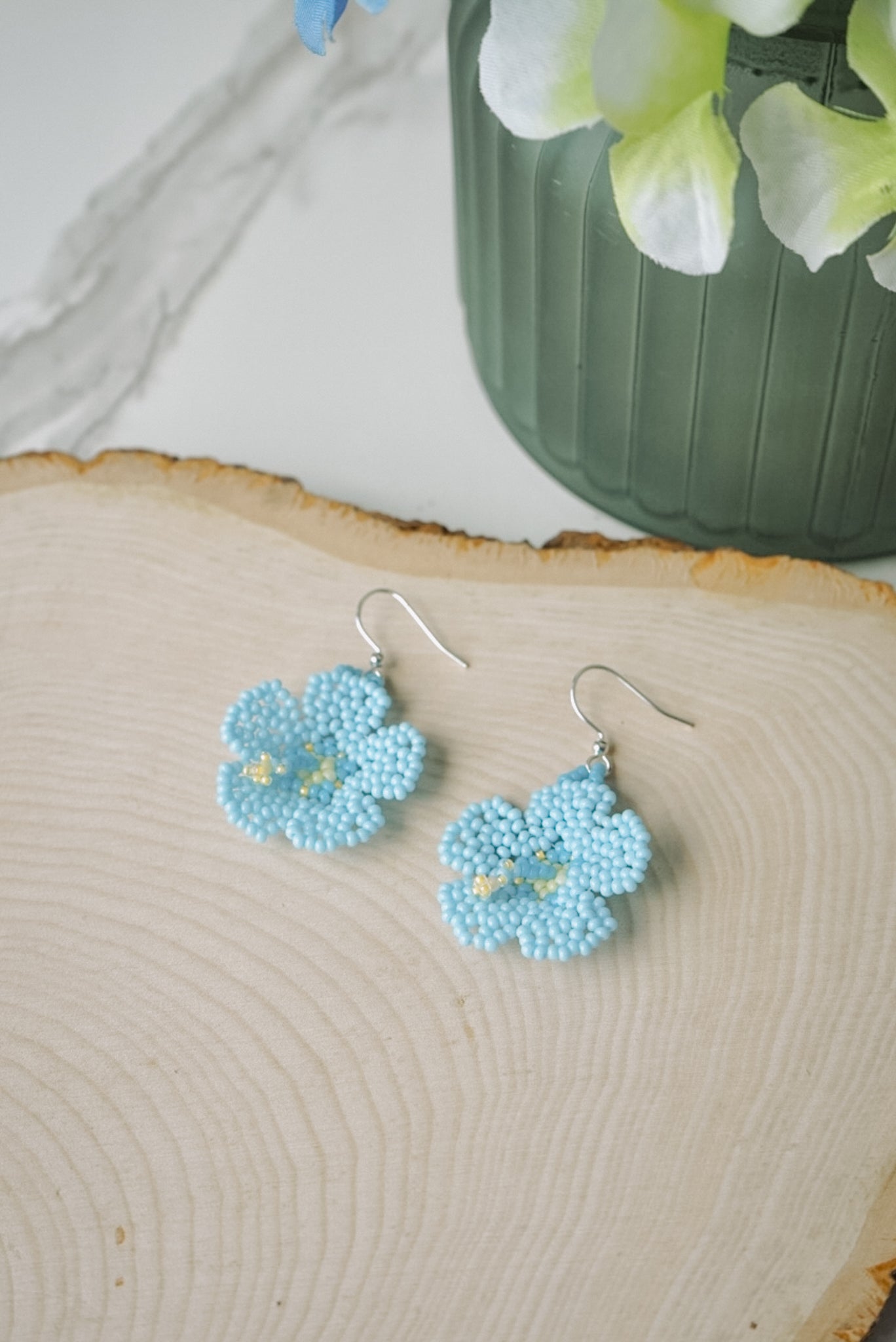 Soft blue hibiscus blooms