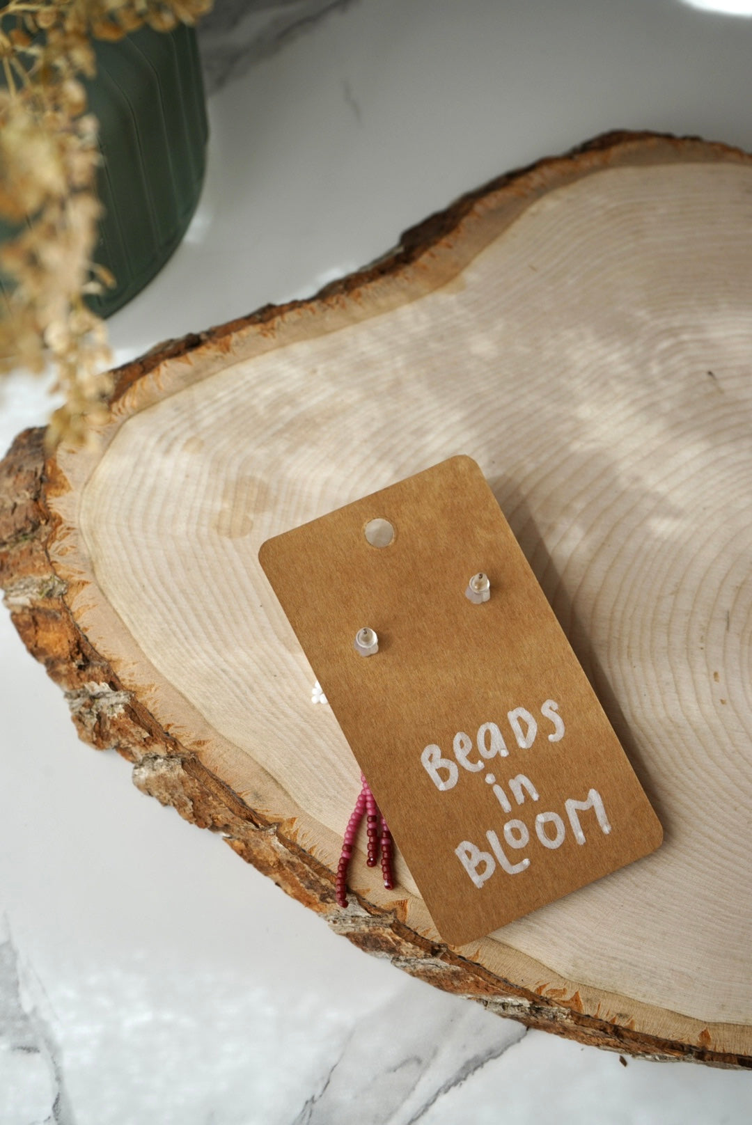 Dewdrop blooms (raspberry studs)