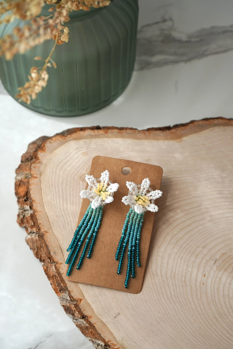 Dewdrop blooms (teal studs)
