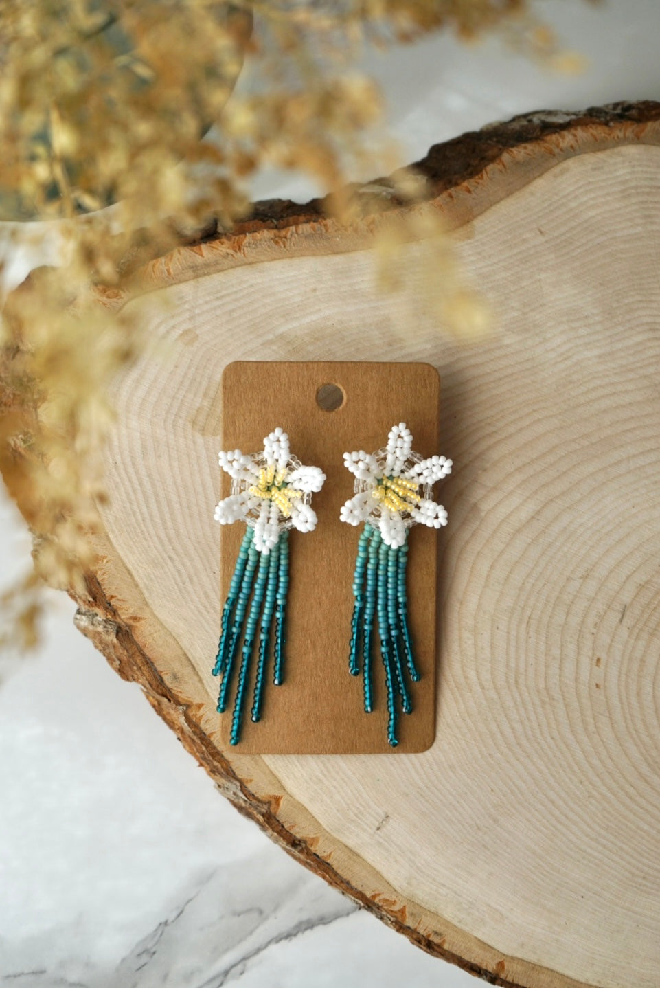 Dewdrop blooms (teal studs)