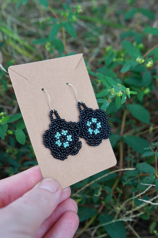 Black and turquoise blooms