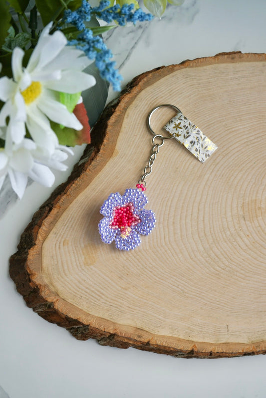 Periwinkle luster hibiscus flower keychain