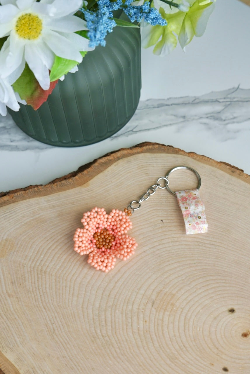 Peach colored flower keychain