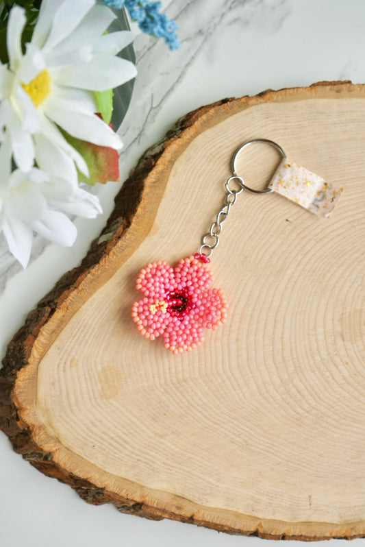 Peachy pink hibiscus keychain