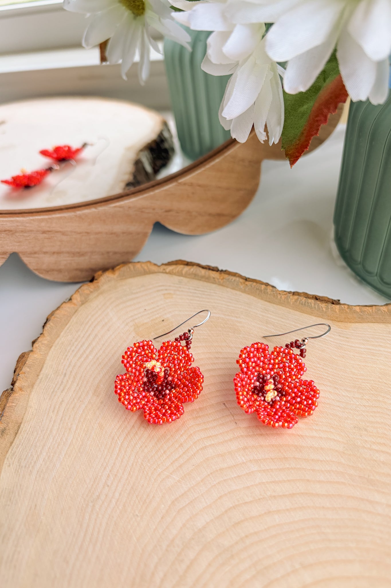 Red pearl hibiscus blooms