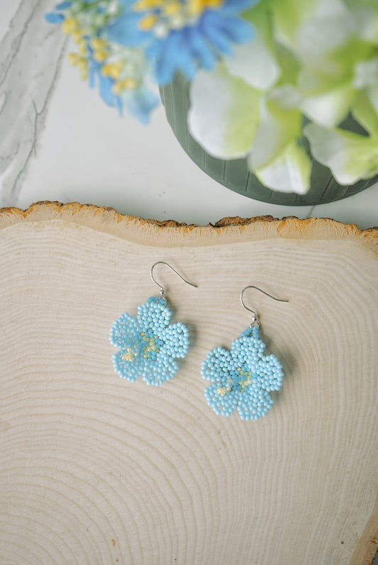 Soft blue hibiscus blooms