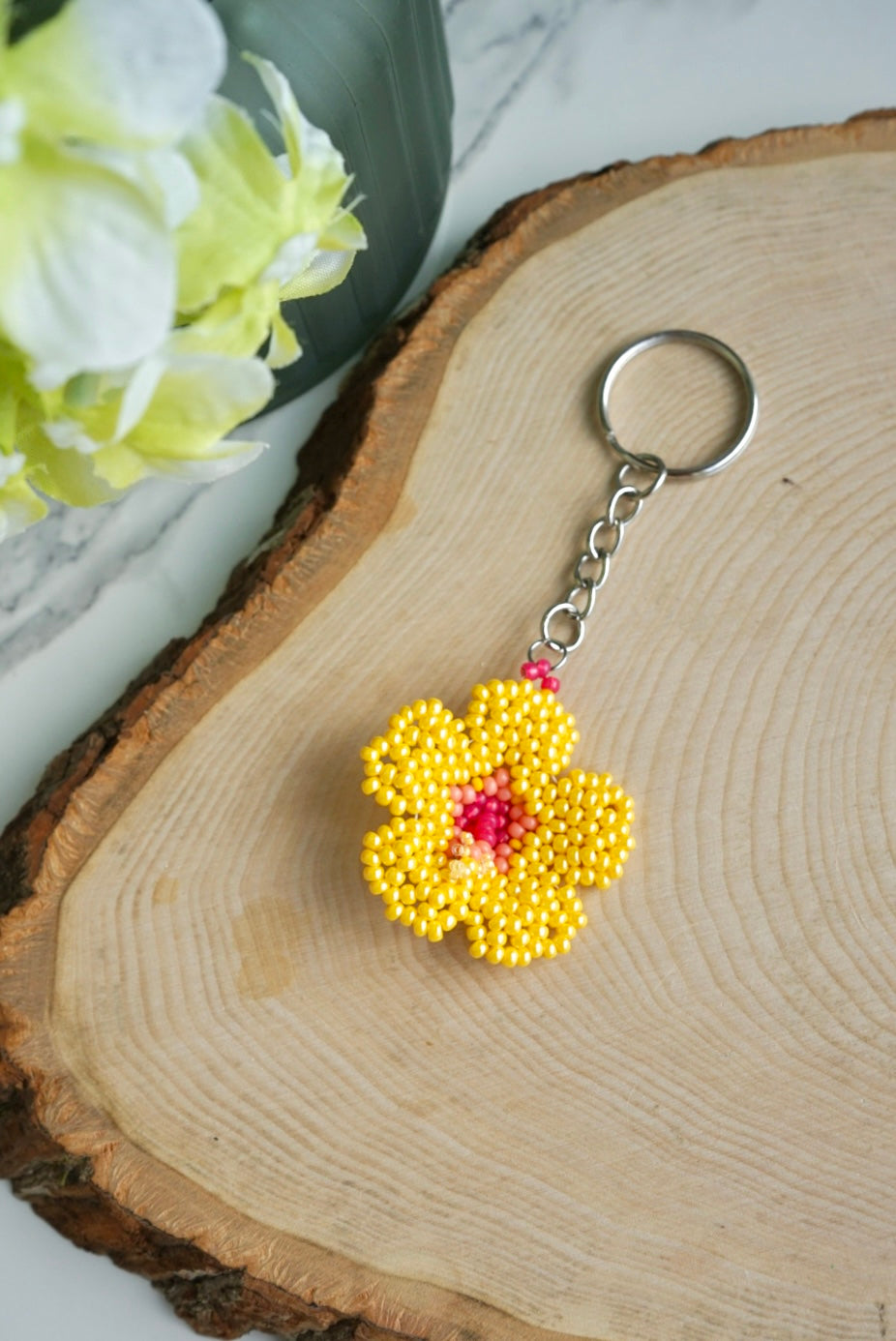 Yellow hibiscus flower keychain